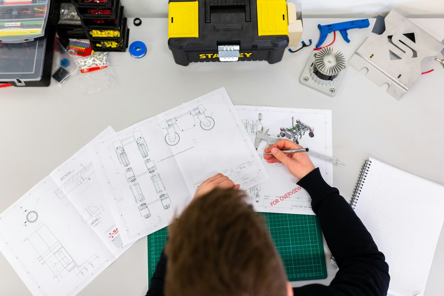 Engineer marking up a site drawing