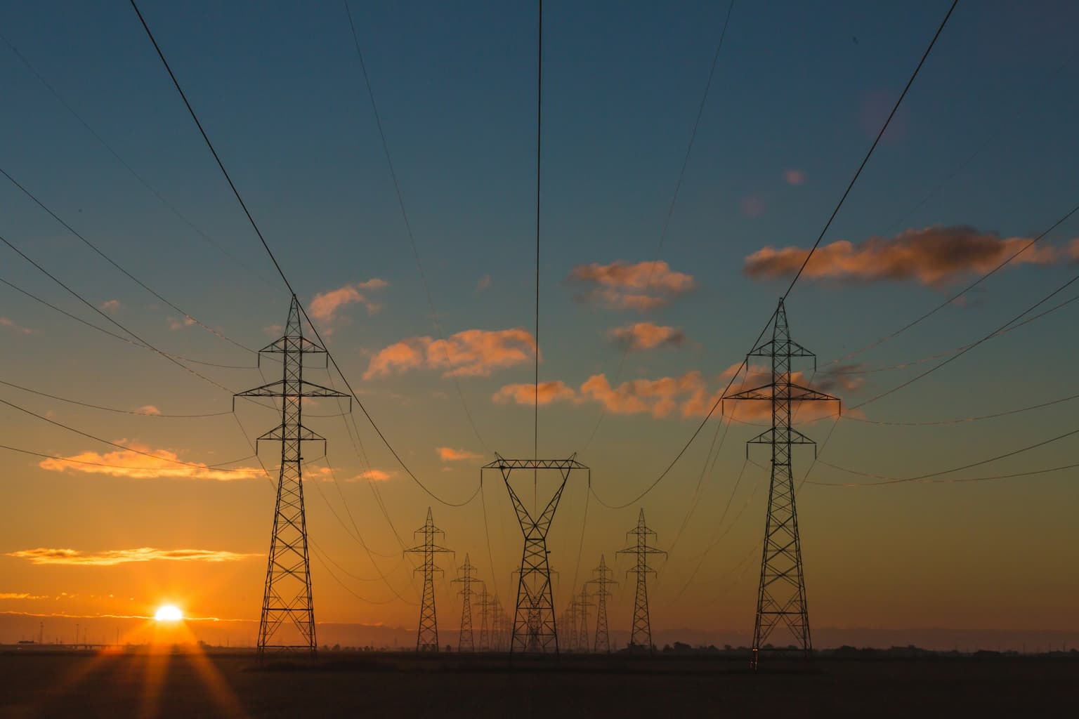 Transmission towers at dusk