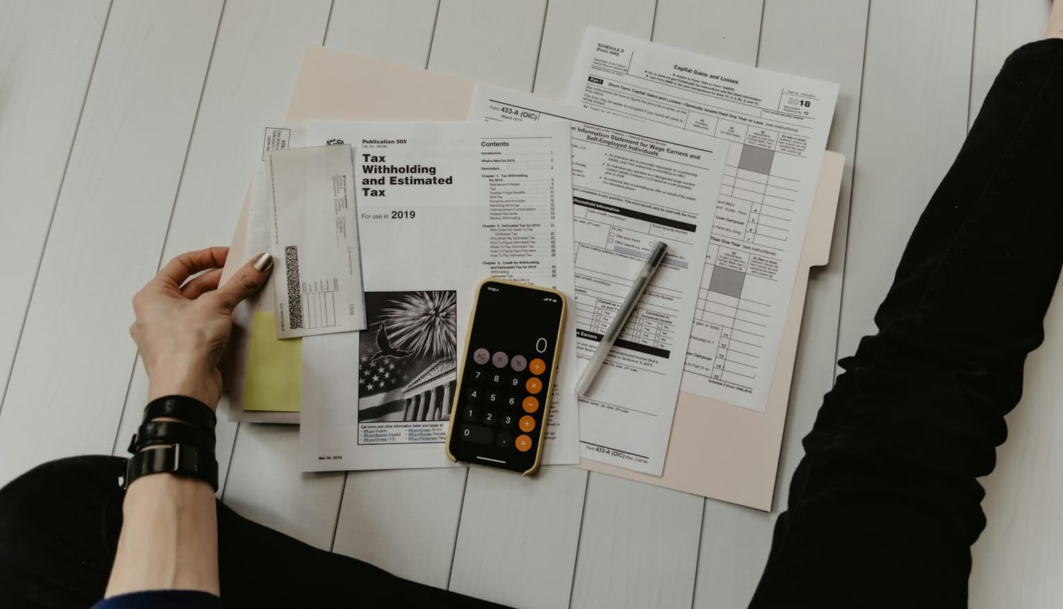 Reviewing an energy bill with a calculator